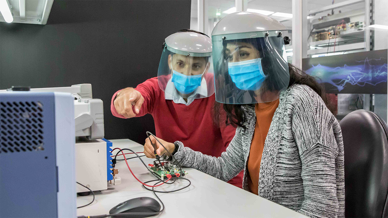 Pradeep and Sahana Krishnan in the lab.